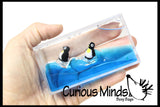 LAST CHANCE - LIMITED STOCK  - Penguins on a Wave - Moving Water -  Sensory, Stress, Fidget Toy